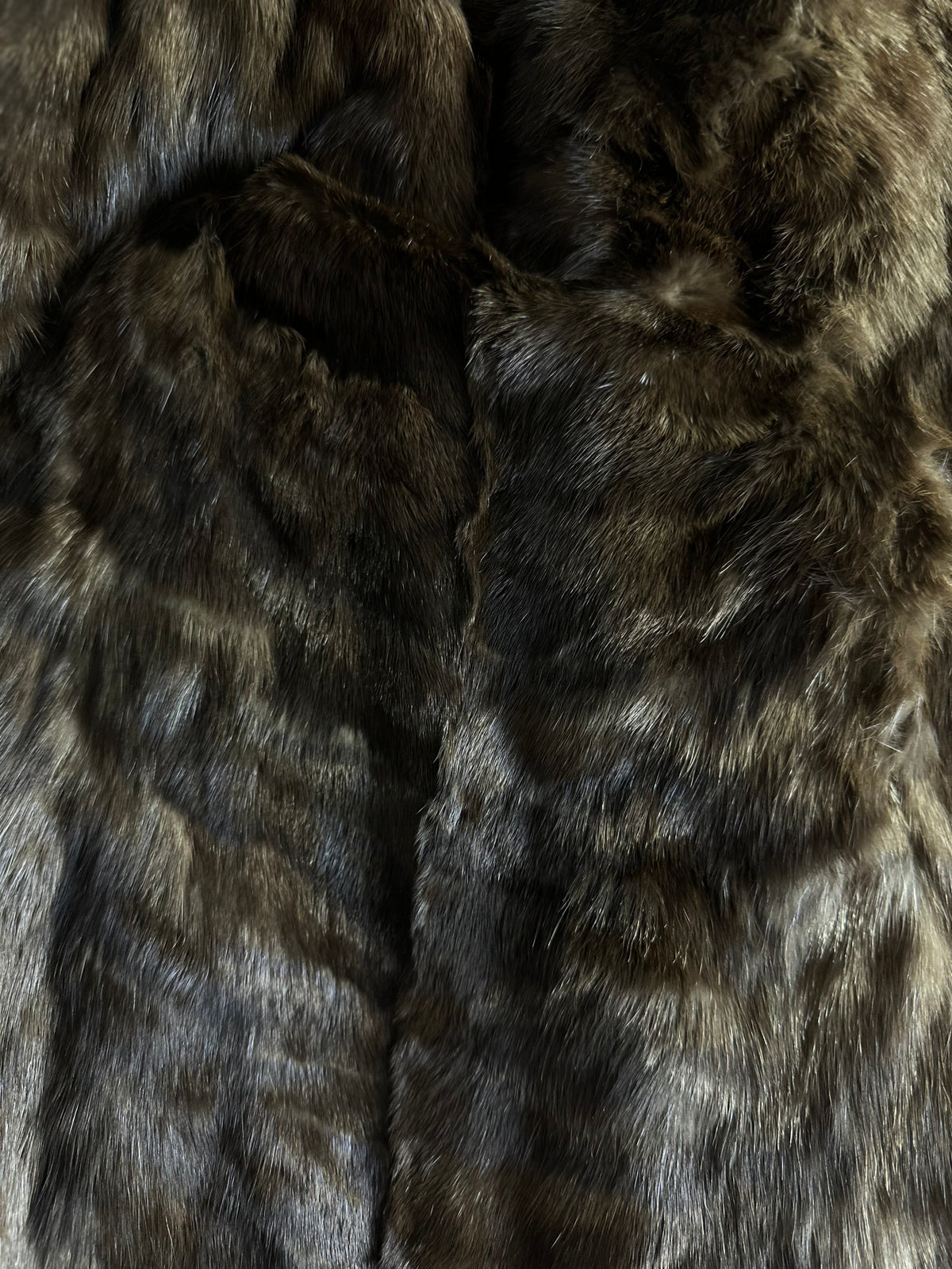 Close-up of brown vintage muskrat fur coat