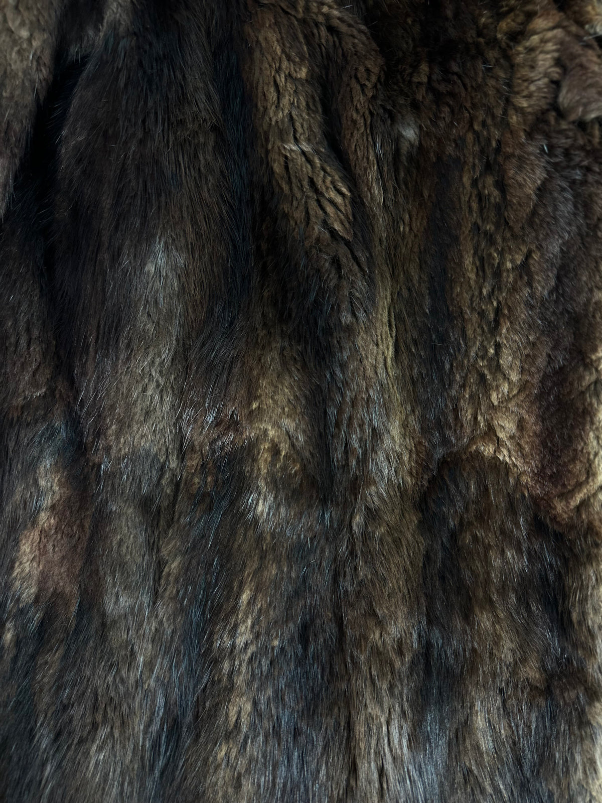 Close-up of brown vintage muskrat fur coat