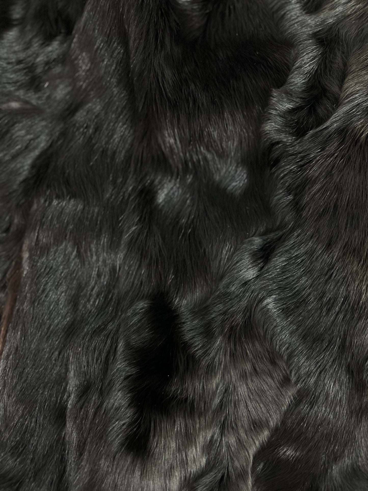 Close-up of brown vintage goat fur coat