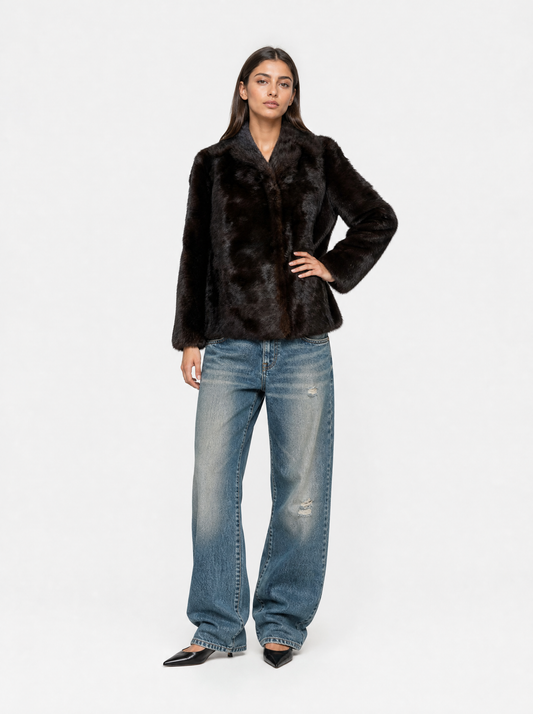 Brown vintage mink fur jacket worn by a model