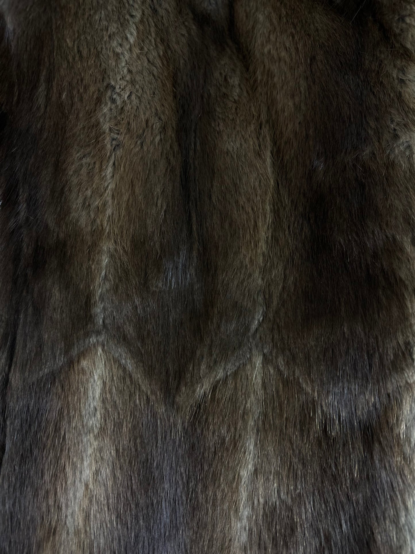 Close-up of brown vintage muskrat fur coat