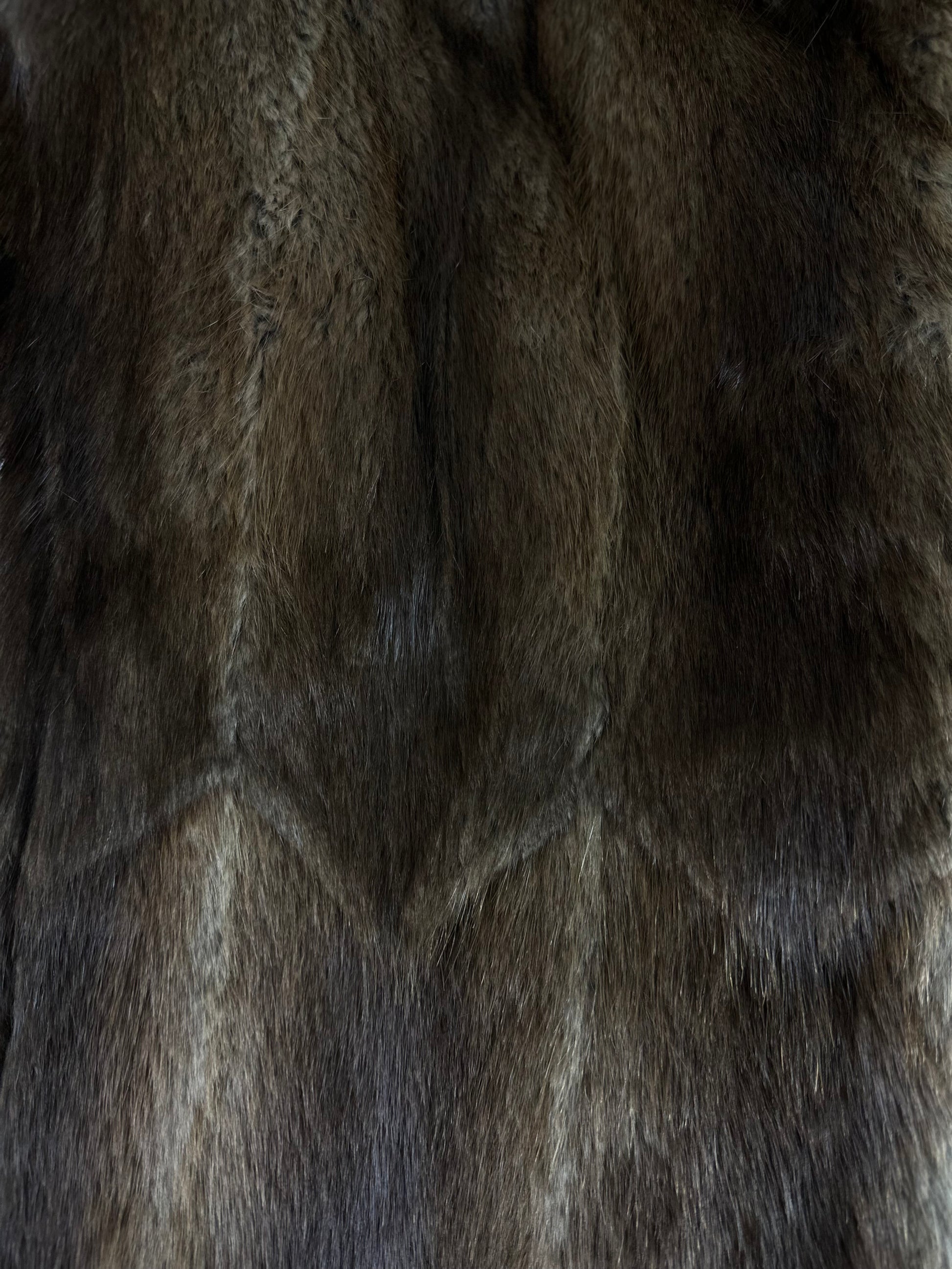 Close-up of brown vintage muskrat fur coat