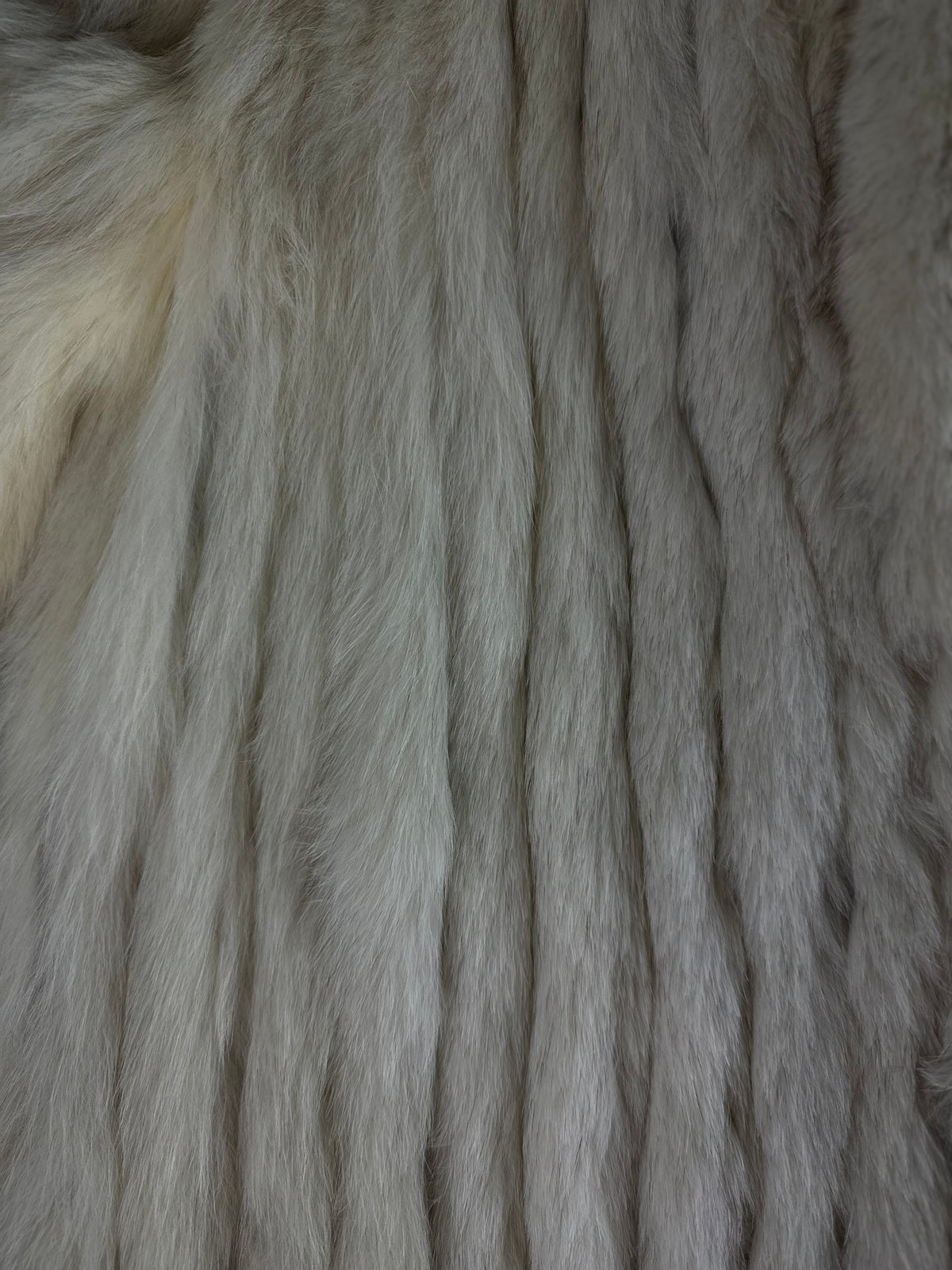 Close-up of white vintage fox fur coat